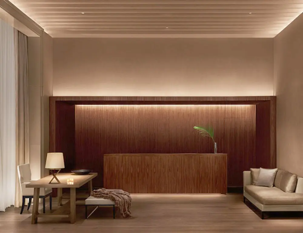 Lobby at Edition Hotel New York by Sentient Furniture wooden reception furniture at the Edition Hotel in London