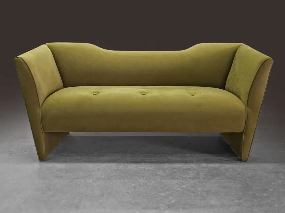 Nersi Sofa by Sentient Nersi Sofa by Sentient in green upholstery inspired by Postmodern and Memphis design. best sofa materials for high-end furniture