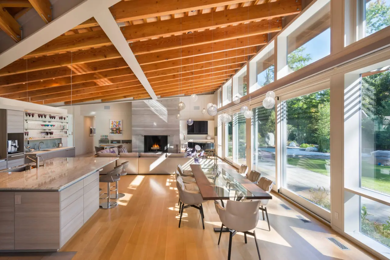a custom SENTIENT contemporary designed walnut Colorado table in a luxury designed living room 