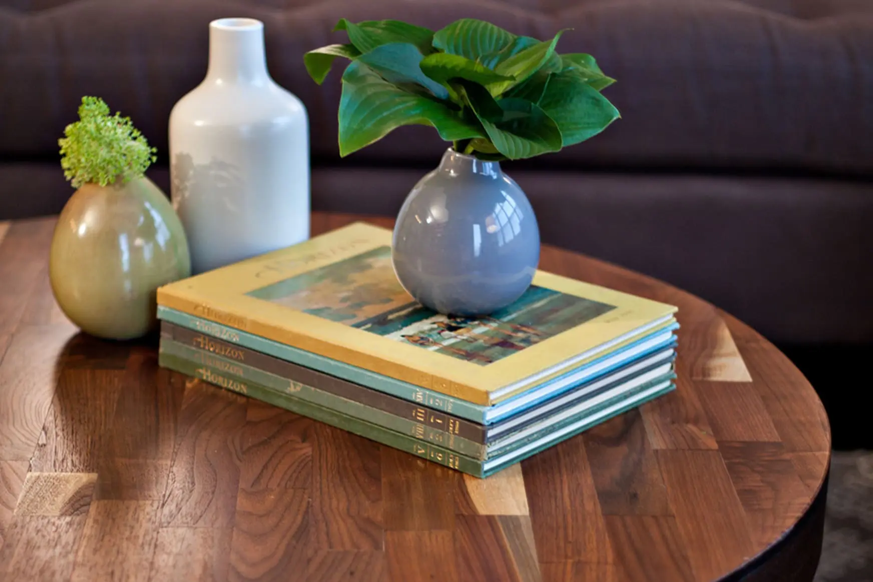 sentient_round_walnut_coffee_table_residental_project2 black wood coffee table with round design