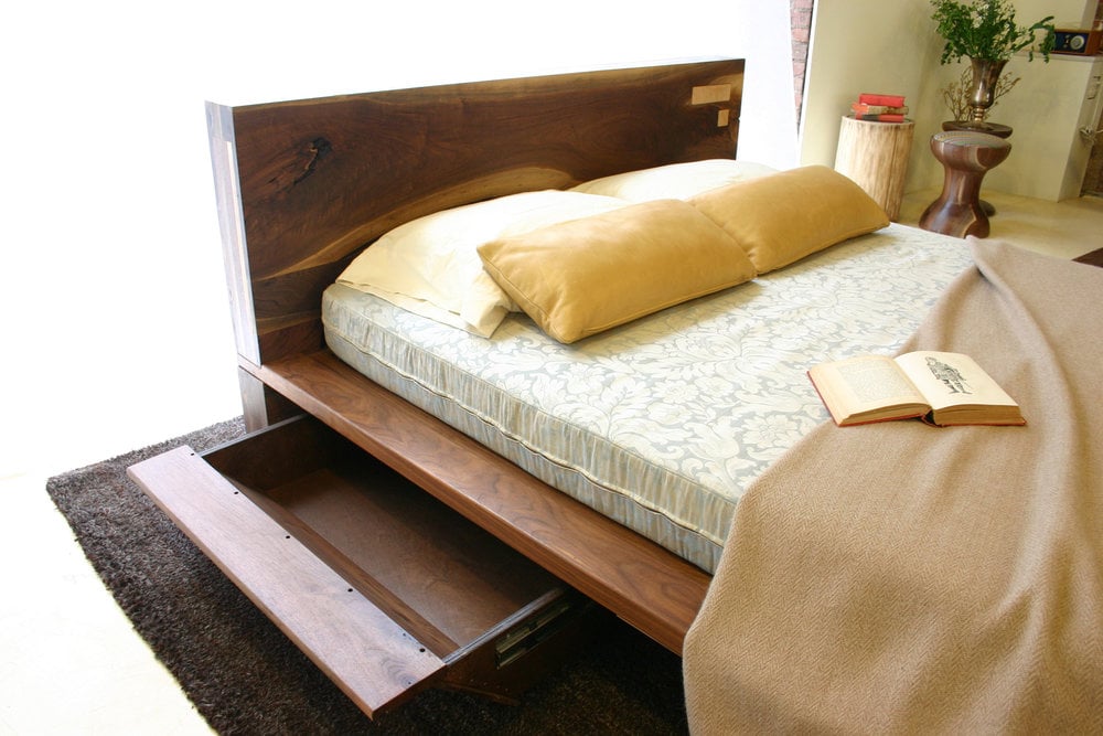a SENTIENT contemporary Liffey Bed wood headboard and platform with open under bed storage drawer and luxury bedding