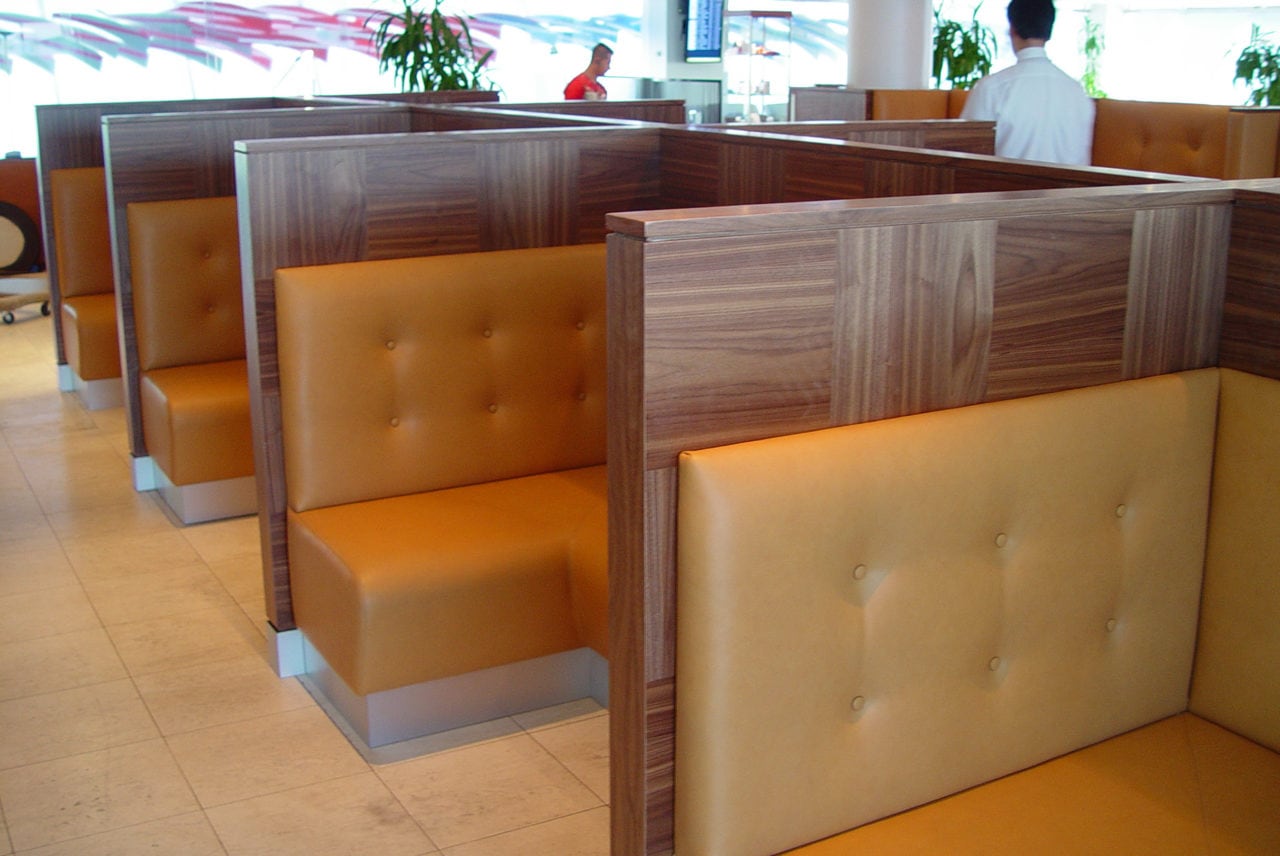 a line of custom SENTIENT contemporary designed luxury leather banquettes in British airways lounge