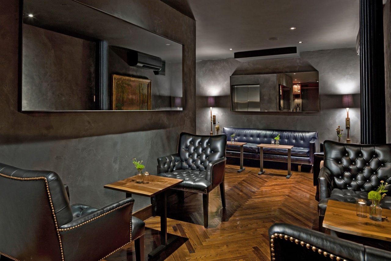 custom SENTIENT contemporary designed wood furniture and luxury tufted upholstery in atera restaurant 