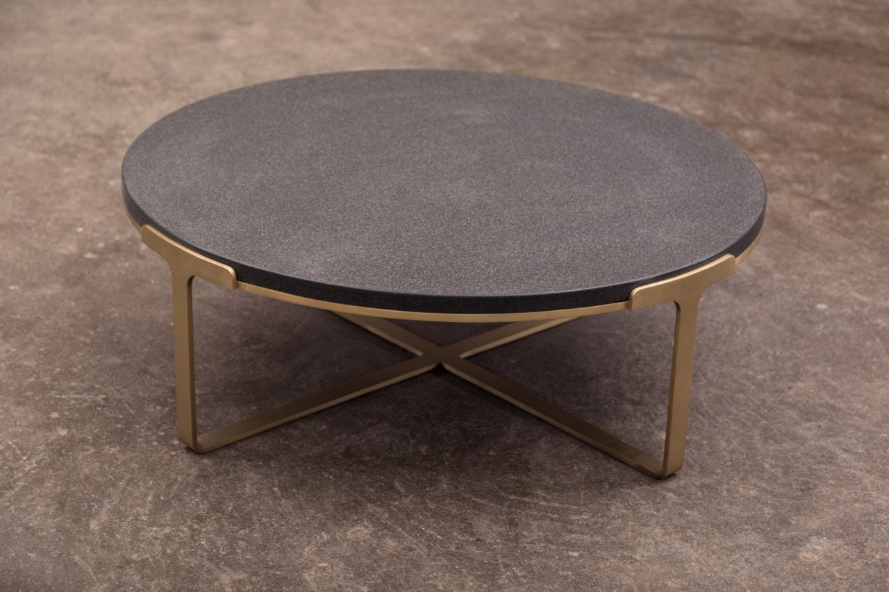 a luxury spotted black stone and brass SENTIENT contemporary designed round custom coffee table