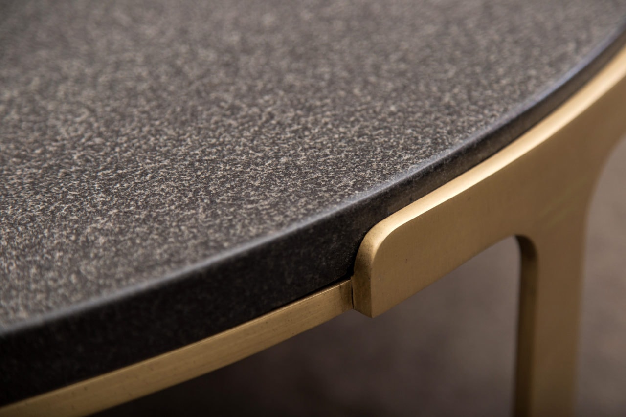 a luxury spotted black stone and brass contemporary designed round custom coffee table detail detail 