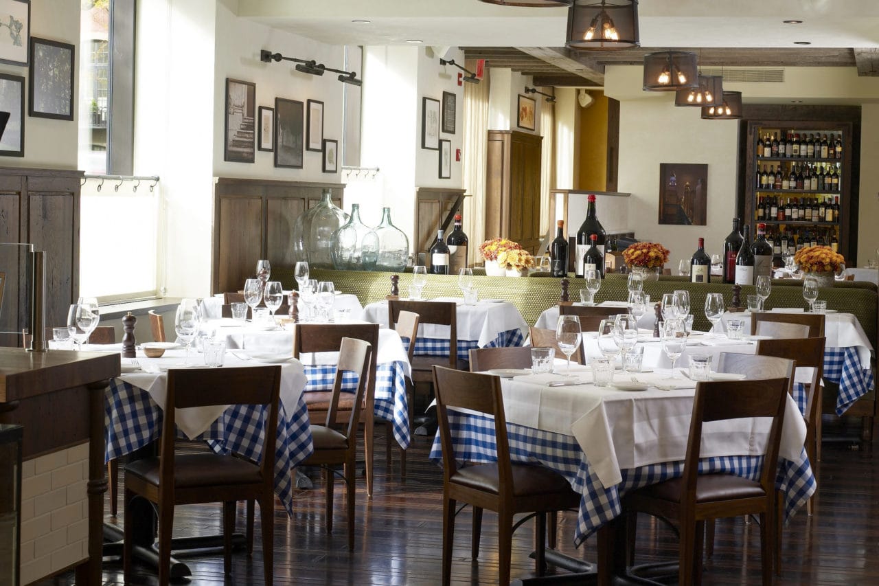 custom SENTIENT contemporary designed tables with luxury blue and white linens with dinning chairs at maiolino restaurant 