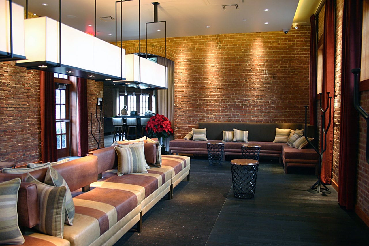 a custom SENTIENT contemporary designed leather corner banquette seating in Virgin luxury spa