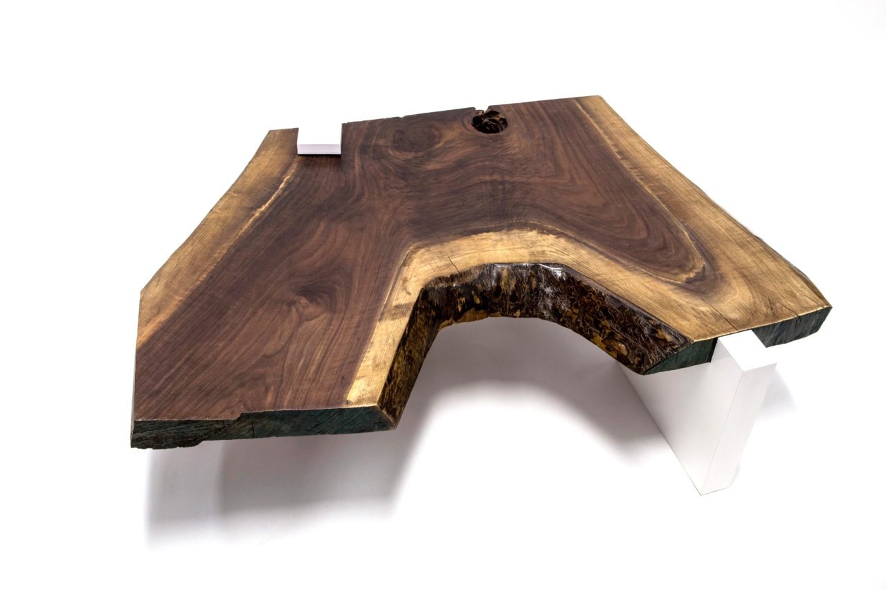 a SENTIENT contemporary walnut exaggerated Live Edge Coffee Table with white plank base