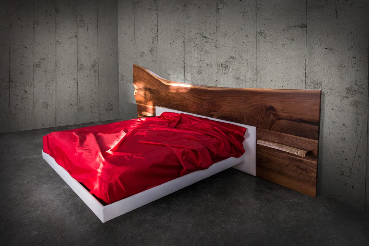 a SENTIENT contemporary designed live edge wood headboard platform bed with custom white luxury leather front view 