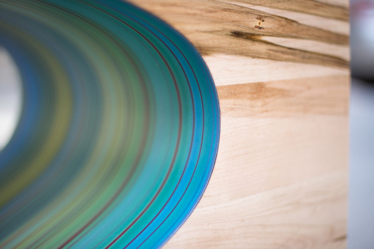 a SENTIENT contemporary Orbit custom maple coffee table detail blue colored oval cutout
