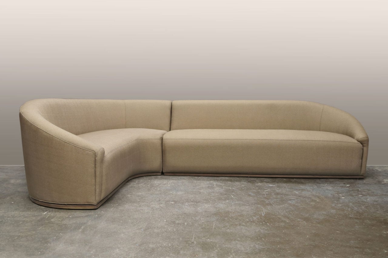 a upholstered SENTIENT contemporary designed baashe custom curved sectional sofa in luxury fabric 