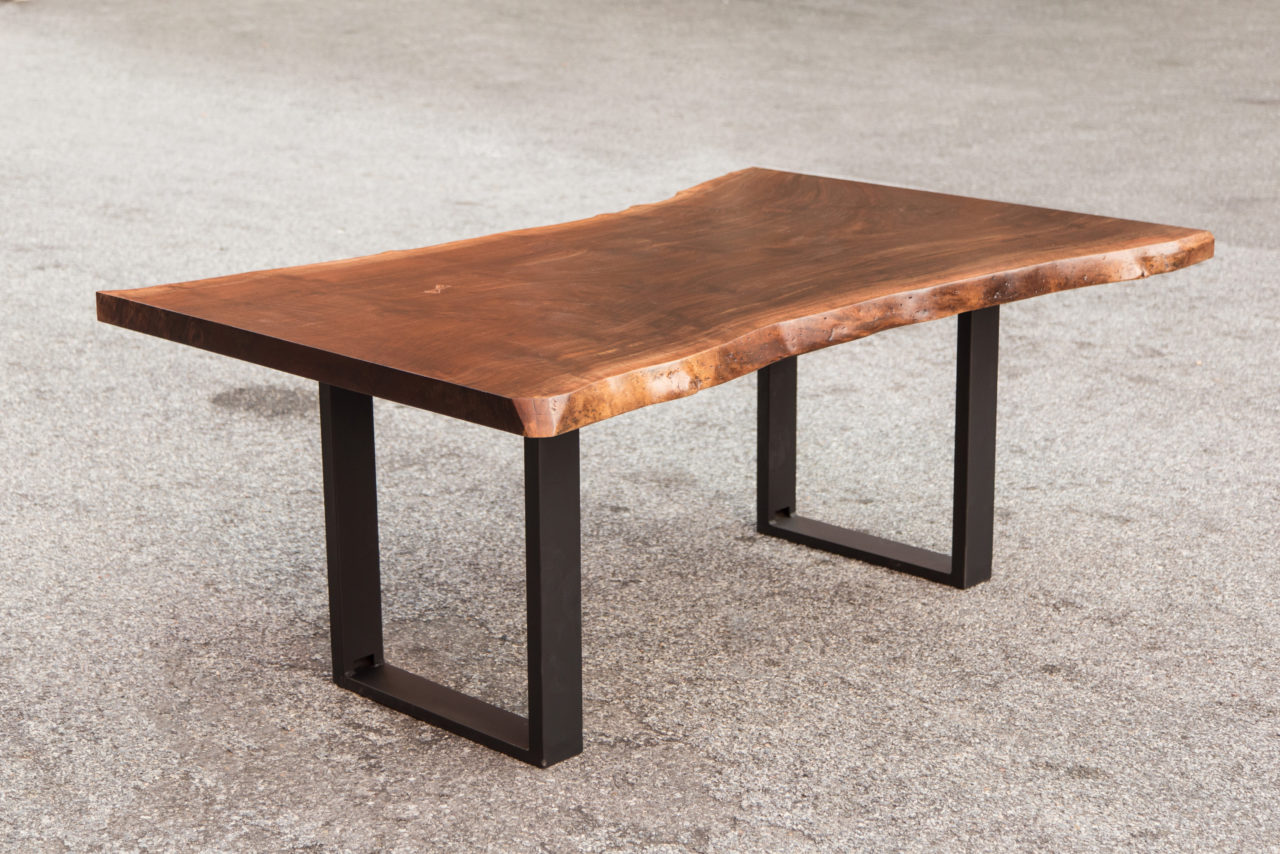 a luxury SENTIENT contemporary designed walnut life edge custom desk with metal square frame legs