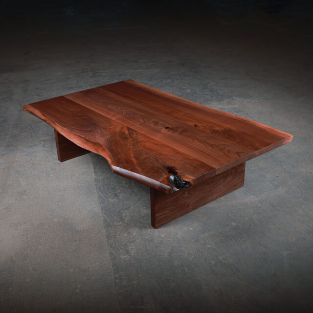 Signature live edge coffee table with a natural black walnut finish.