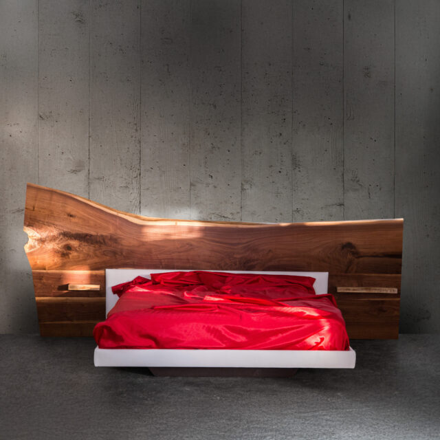 Live-edge bed with a striking natural wood headboard and integrated floating nightstands, creating a seamless blend of modern and rustic design.