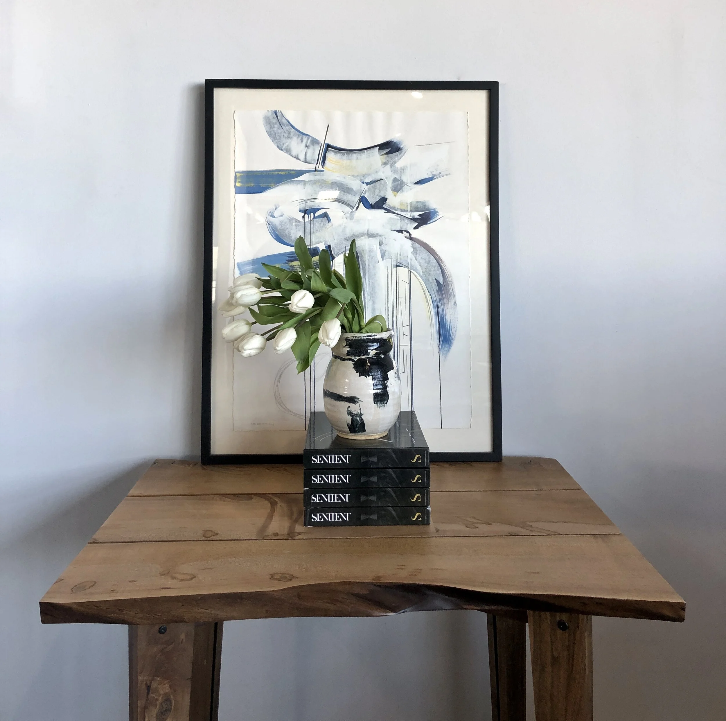 A Custom SENTIENT LiVE Edge Table With Canted Post Base