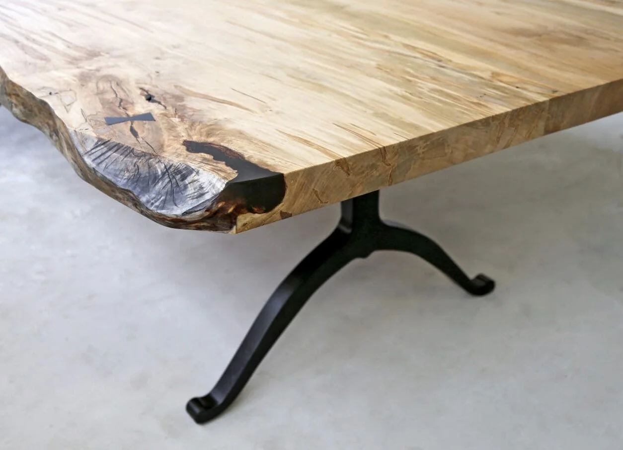 A SENTIENT Signature Live Edge Table In Ambrosia Maple With Blackened Steel Wishbone Base