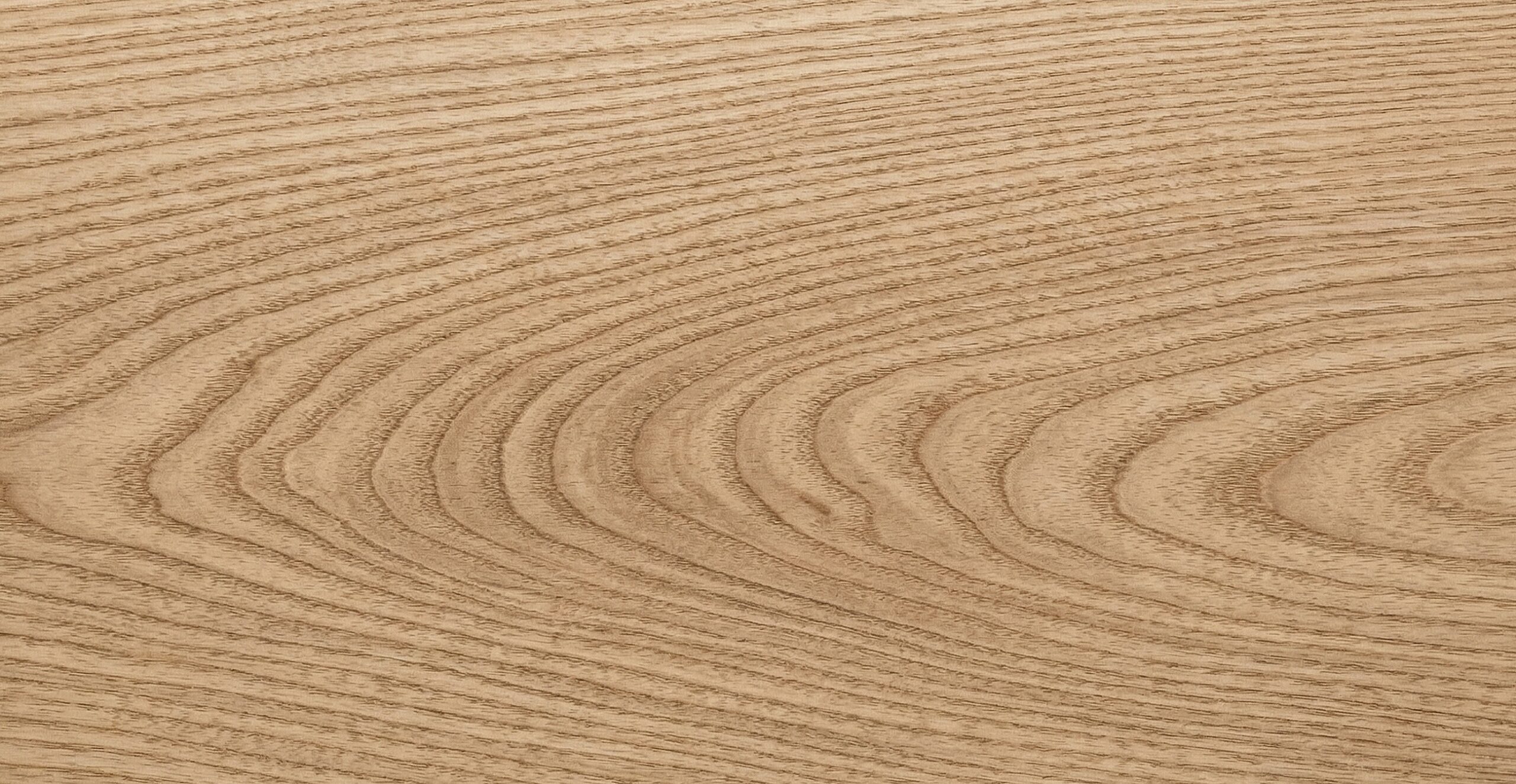 Ash wood grain showing natural color and texture