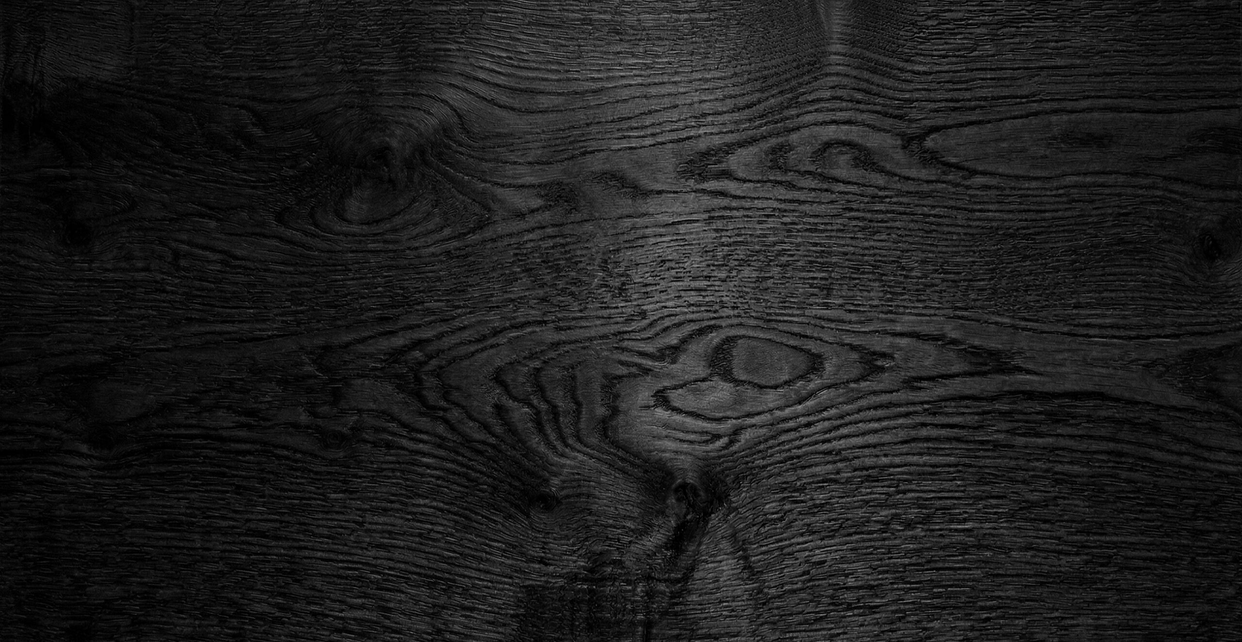 Charred wood finish showing surface appearance and sheen